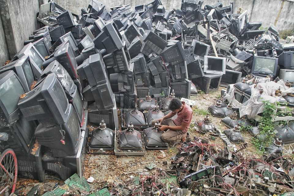 E-waste of televisions in a dump yard. 